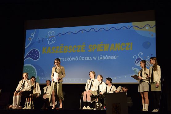 Grafika 16: Kaszëbsczé spiéwanczi "Mòtilkòwô ùczba w Lãbòrgù"  (11.03.2024)