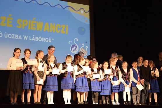 Grafika 33: Kaszëbsczé spiéwanczi "Mòtilkòwô ùczba w Lãbòrgù"  (11.03.2024)