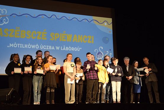 Grafika 39: Kaszëbsczé spiéwanczi "Mòtilkòwô ùczba w Lãbòrgù"  (11.03.2024)